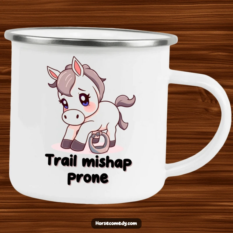 Funny camping mug showing a horse comically tripping over a tiny, shiny horseshoe with a surprised look.