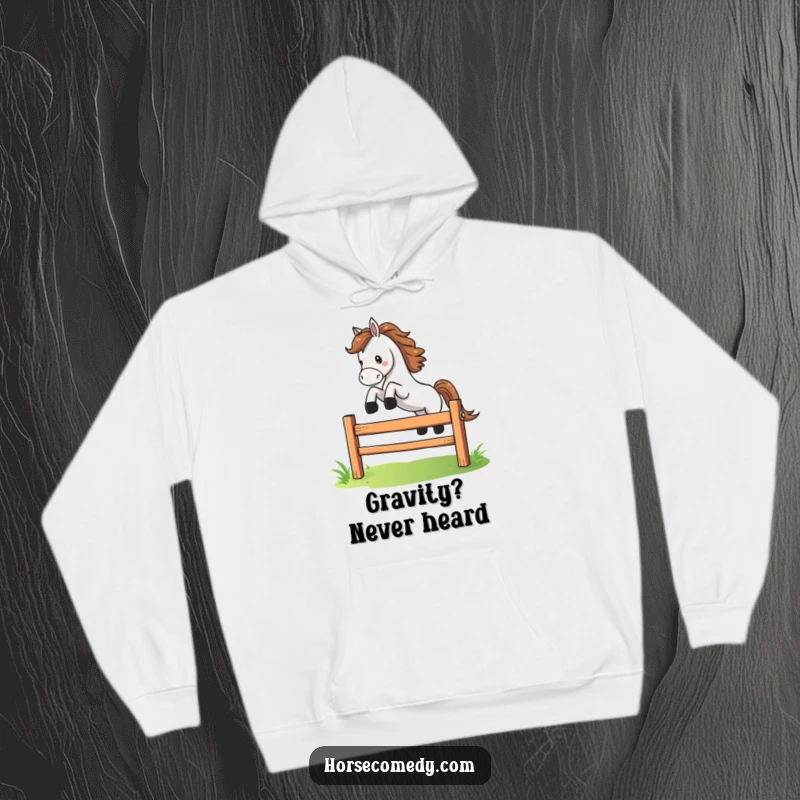 Funny horse character dramatically leaping over a small, colorful fence on a hoodie, offering cozy, energetic, comical flair.