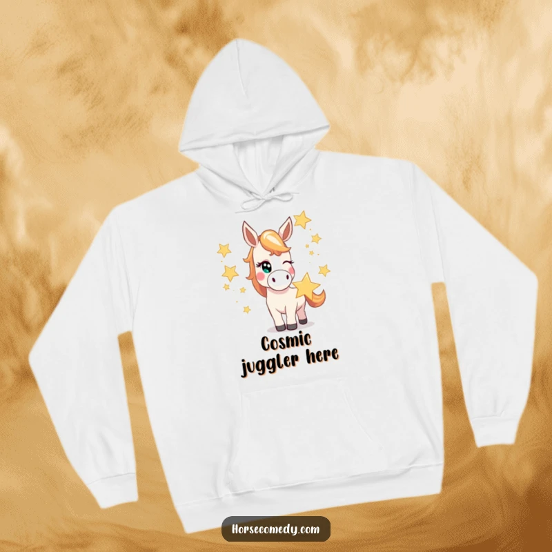 Funny horse hoodie featuring a mischievous horse character winking while juggling oversized, bright stars, radiating celestial charm.