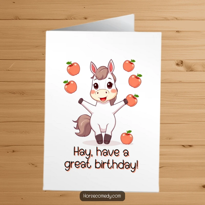 Funny Free Printable Birthday Card: Happy horse gleefully juggling shiny apples, a comical scene for a festive greeting.