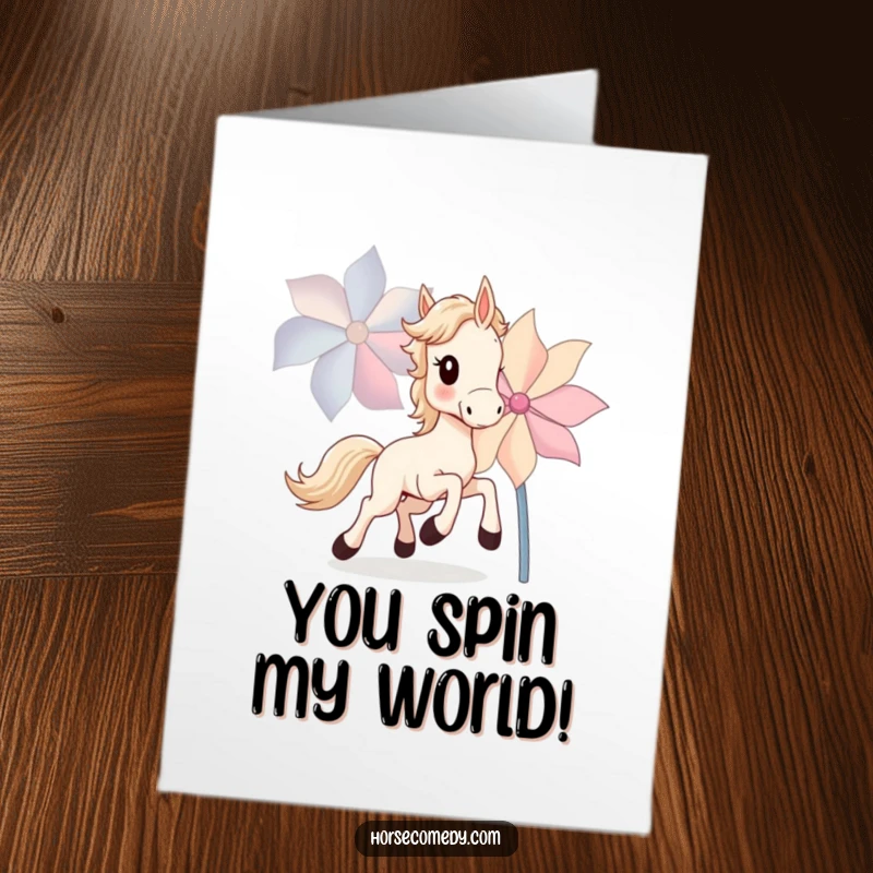 Funny Free Printable Congratulations Card showing a horse cub joyfully chasing after a large, spinning pinwheel with excitement.