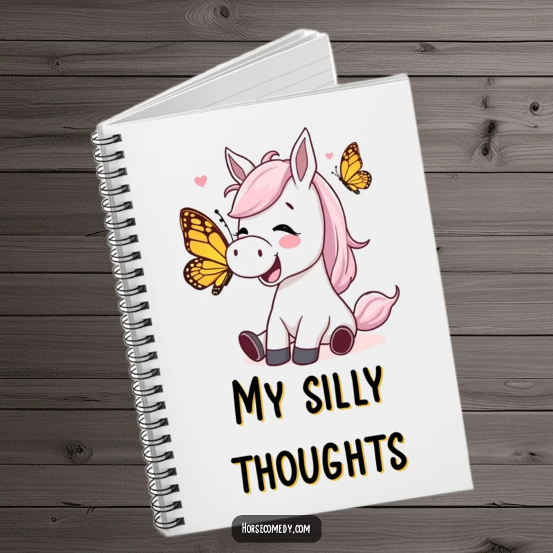 Funny horse character giggling while being tickled by a playful butterfly on a notebook, ideal for jotting down happy thoughts.