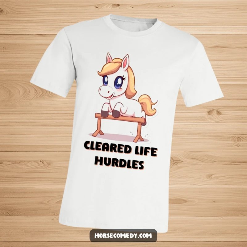Funny T-Shirt: A horse with oversized, sparkling eyes performs a joyful leap over a small hurdle.