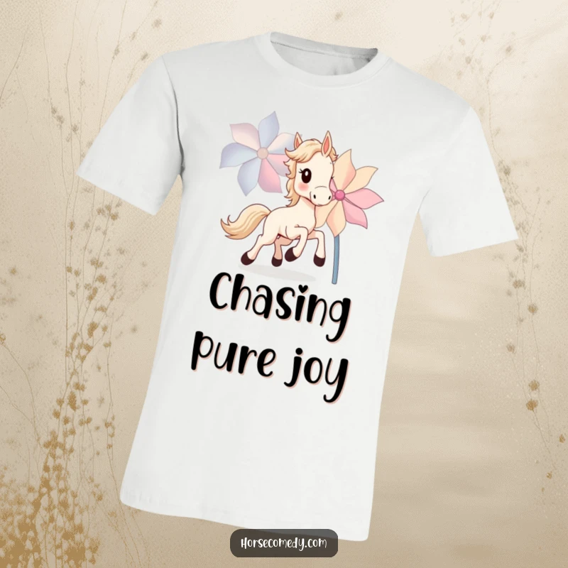 Funny Horse Cub T-Shirt featuring a young horse cub gleefully chasing a large, spinning pinwheel with boundless energy.