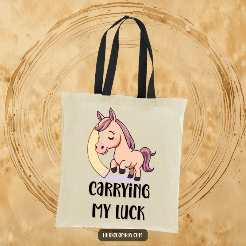 Funny tote bag with a playful horse character nudging a giant, glowing horseshoe with its nose, perfect for carrying items with luck.